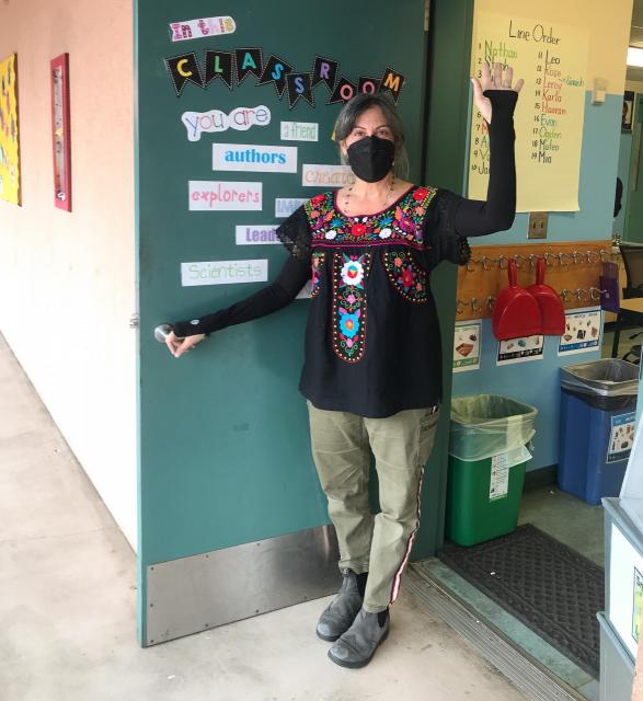 Kristi Jacobson at her classroom door