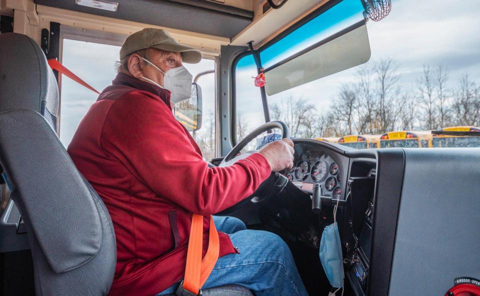 rural bus driver wearing a face mask