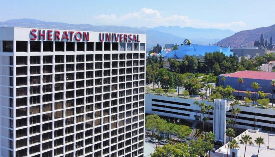 Sheraton Universal hotel with mountains in distance 