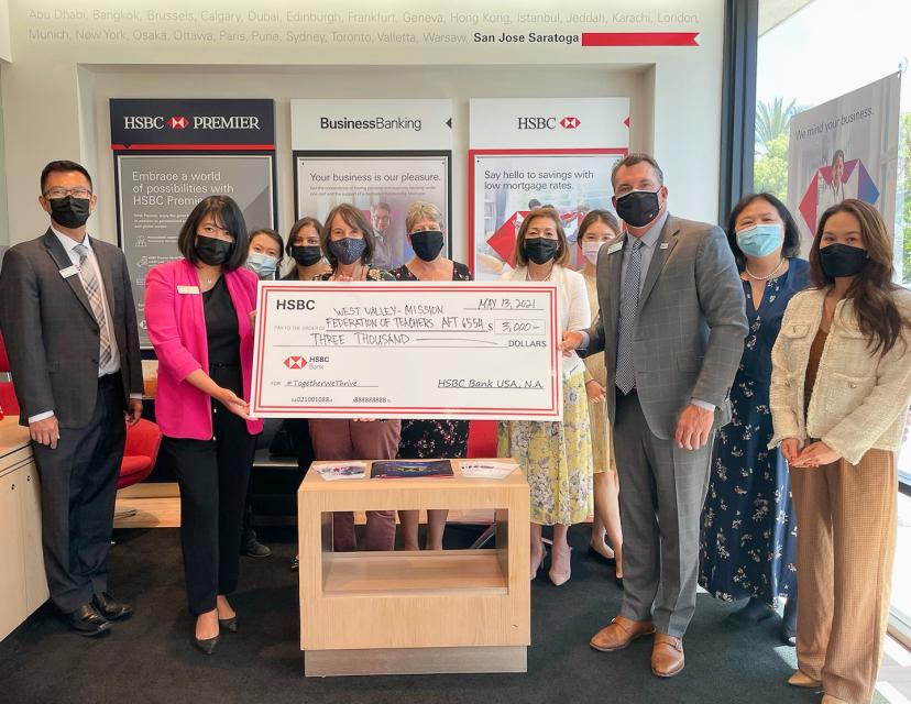 West Valley-Mission Federation receiving check from HSBC, all wearing masks