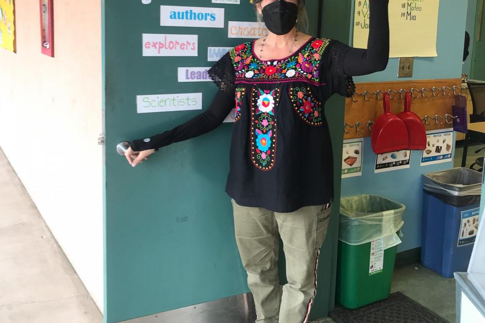 Kristi Jacobson at her classroom door