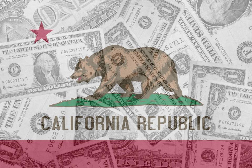 California Republic flag with dollar bills in background