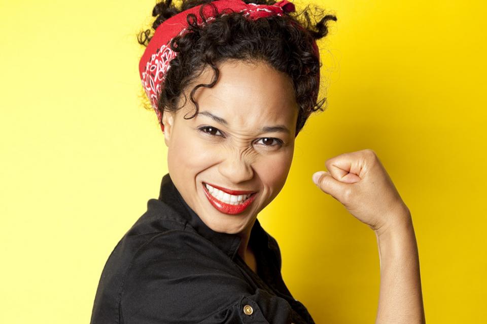 union strong woman dressed as Rosie the Riveter