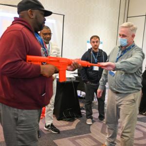 Members doing safety training with fake orange guns
